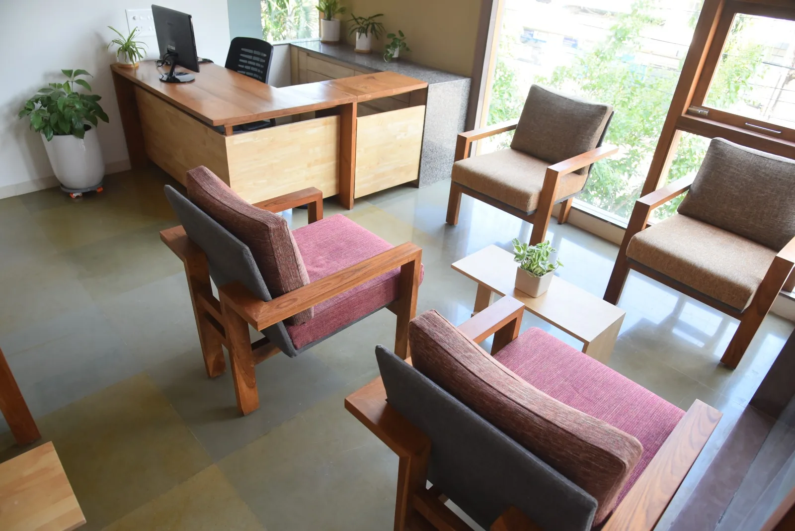 Reception and waiting area with comfortable armchairs